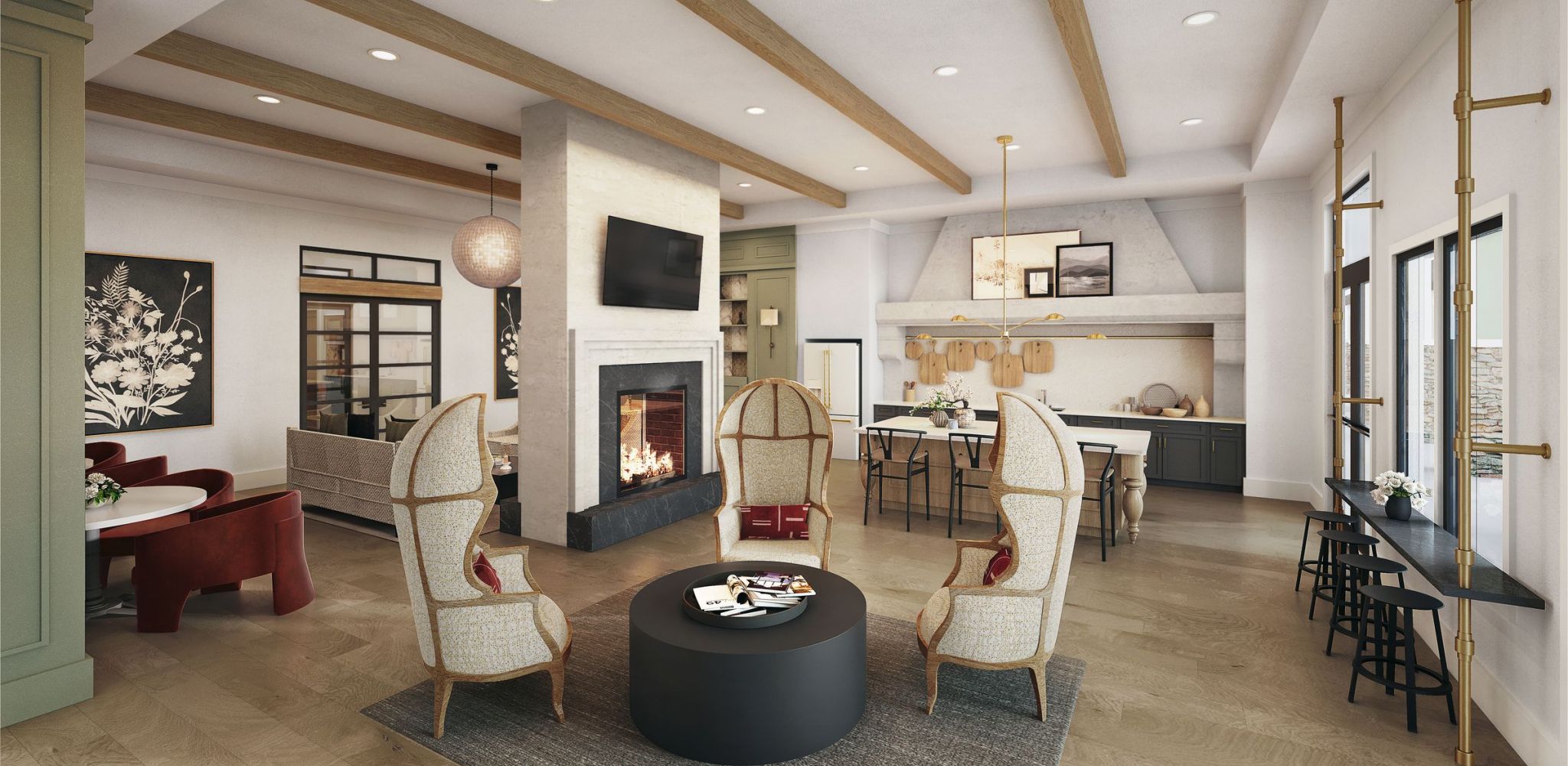 Hawthorne at Traditions beautiful resident clubroom with a fireplace, seating area, and a community kitchen