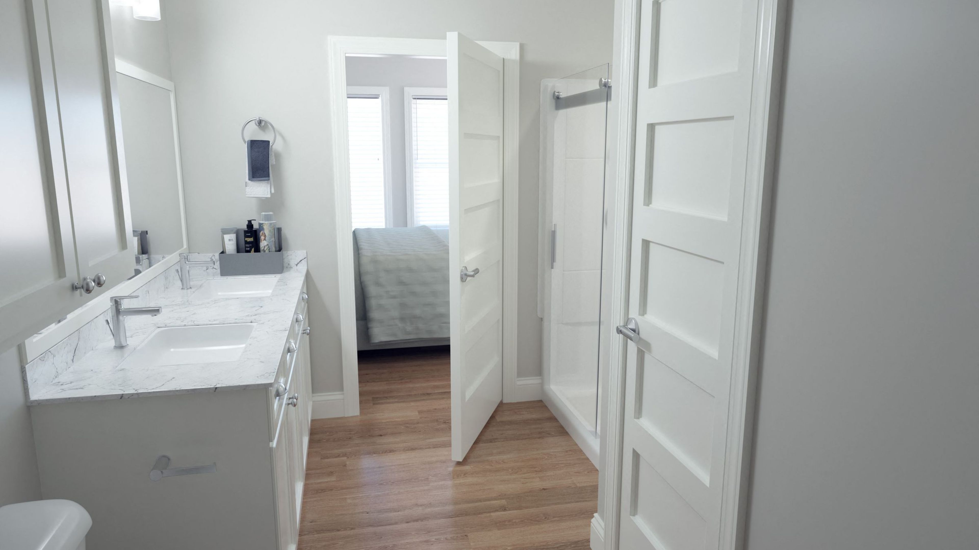 Hawthorne at Traditions apartment bathroom with double vanity, glass enclosed shower, and linen closet, looking into bedroom